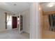 Bedroom with access to bathroom and patio at 1618 Cypress Pt, Lady Lake, FL 32159