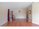 Living room with wood floors, sliding door, and a view at 1618 Cypress Pt, Lady Lake, FL 32159