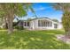 Charming single-wide manufactured home with a spacious yard at 1618 Cypress Pt, Lady Lake, FL 32159