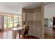 Kitchen dining area with a view and wood flooring at 1618 Cypress Pt, Lady Lake, FL 32159