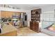 Kitchen with stainless steel appliances and wood cabinets at 16290 Sw 17Th Ave, Ocala, FL 34473