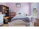 Bright bedroom featuring a white bed frame and ample natural light at 16290 Sw 17Th Ave, Ocala, FL 34473