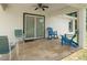 Covered patio with seating area and ceiling fan at 16290 Sw 17Th Ave, Ocala, FL 34473
