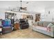 Open living space with vaulted ceilings, a ceiling fan, and lots of natural light at 16290 Sw 17Th Ave, Ocala, FL 34473