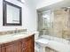 Bathroom with granite vanity and glass shower at 16290 Sw 17Th Ave, Ocala, FL 34473