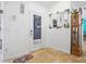 Bright entryway with tile flooring, a coat closet, and a large mirror at 16290 Sw 17Th Ave, Ocala, FL 34473