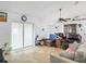 Living room with tiled floors, ceiling fan, and ample natural light at 16290 Sw 17Th Ave, Ocala, FL 34473