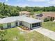 Aerial view of a single-Gathering home with a spacious yard and surrounding landscape at 16290 Sw 17Th Ave, Ocala, FL 34473
