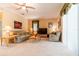 Bright living room with ample seating and a ceiling fan at 2291 Nw 59Th Ter, Ocala, FL 34482