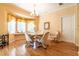 Dining area with bay window, hardwood floors and a chandelier at 2291 Nw 59Th Ter, Ocala, FL 34482