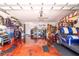 Garage with metallic epoxy floor, workbench, and ample storage at 2291 Nw 59Th Ter, Ocala, FL 34482