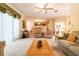Spacious living room featuring comfortable seating and a large window at 2291 Nw 59Th Ter, Ocala, FL 34482