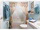 Well-lit bathroom with shower/tub combo and updated fixtures at 2291 Nw 59Th Ter, Ocala, FL 34482