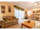Living room with ample natural light and neutral color palette at 2291 Nw 59Th Ter, Ocala, FL 34482