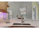 Kitchen features a large sink, modern faucet, and ample counter space at 4320 Se 106Th St, Belleview, FL 34420