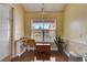 Bright breakfast nook with backyard view and built-in shelving at 4320 Se 106Th St, Belleview, FL 34420