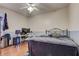Bedroom with a bed, desk and window, carpeted floor at 4320 Se 106Th St, Belleview, FL 34420