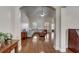 Spacious living room with hardwood floors and a sectional sofa at 4320 Se 106Th St, Belleview, FL 34420