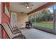 Screened porch with ceiling fan and Blackstone griddle at 4320 Se 106Th St, Belleview, FL 34420