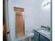 Clean bathroom with granite countertop and shower at 535 W Silver Springs Pl, Ocala, FL 34475
