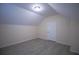 Large bedroom with vaulted ceilings and tile flooring at 535 W Silver Springs Pl, Ocala, FL 34475