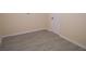 Empty room with light walls and tile flooring at 535 W Silver Springs Pl, Ocala, FL 34475