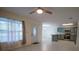 Open concept living area with new flooring and modern fixtures at 535 W Silver Springs Pl, Ocala, FL 34475