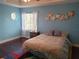Bedroom with a double bed and a window view at 6895 Se 96Th Place Rd, Belleview, FL 34420