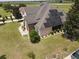 Aerial view of home with solar panels and spacious yard at 6895 Se 96Th Place Rd, Belleview, FL 34420