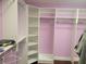 Spacious walk-in closet with ample shelving at 6895 Se 96Th Place Rd, Belleview, FL 34420