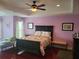 Spacious main bedroom with hardwood floors at 6895 Se 96Th Place Rd, Belleview, FL 34420