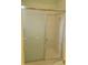 Clean bathroom with a shower and tiled walls at 6895 Se 96Th Place Rd, Belleview, FL 34420