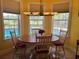 Breakfast nook with pool view at 6895 Se 96Th Place Rd, Belleview, FL 34420