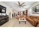 Spacious living area with open floor plan and view into the kitchen at 6701 Sw 94Th Cir, Ocala, FL 34481