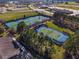 Aerial view of well-maintained community tennis courts at 6701 Sw 94Th Cir, Ocala, FL 34481