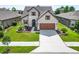 Two-story house with a large driveway and front yard at 6701 Sw 94Th Cir, Ocala, FL 34481