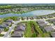 Aerial view of houses, lake, and golf course at 6701 Sw 94Th Cir, Ocala, FL 34481