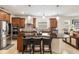 Modern kitchen with large island and stainless steel appliances at 6701 Sw 94Th Cir, Ocala, FL 34481