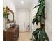 Bright and spacious entryway with decorative console table and mirror at 6701 Sw 94Th Cir, Ocala, FL 34481