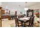 Open concept dining room with view into kitchen and Gathering room at 6701 Sw 94Th Cir, Ocala, FL 34481