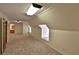Spacious bonus room with sloped ceilings and ample natural light at 1321 Sw 42Nd St, Ocala, FL 34471