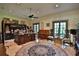 Spacious home office with large desk and piano at 1321 Sw 42Nd St, Ocala, FL 34471