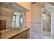 Bathroom with a vanity, shower, and unique lattice wall detail at 1321 Sw 42Nd St, Ocala, FL 34471