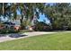 Brick home with large lawn and driveway at 1321 Sw 42Nd St, Ocala, FL 34471