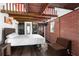 Relaxing bedroom with wooden beams and a comfortable bed at 14181 Se 211Th Court, Umatilla, FL 32784