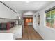 Open concept kitchen and living area with modern appliances at 14181 Se 211Th Court, Umatilla, FL 32784