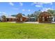 Quaint cabins nestled in a lush green lawn at 14181 Se 211Th Court, Umatilla, FL 32784
