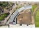 Aerial view of arena, stables and surrounding land at 14181 Se 211Th Court, Umatilla, FL 32784