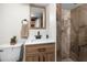 Modern bathroom with a clean vanity and a walk-in shower at 14181 Se 211Th Court, Umatilla, FL 32784