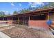 Spacious barn stalls with hay feeders at 14181 Se 211Th Court, Umatilla, FL 32784